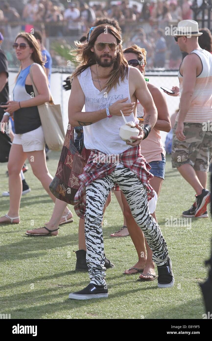 jared Leto enjoys Coconut water and Ultimate Warrior Charachter follows  jared at day 2 Coachella Featuring: Jared Leto Where: Los Angeles,  California, United States When: 12 Apr 2014 Stock Photo - Alamy