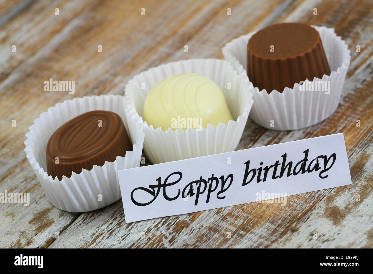 Happy birthday card with assorted chocolates Stock Photo