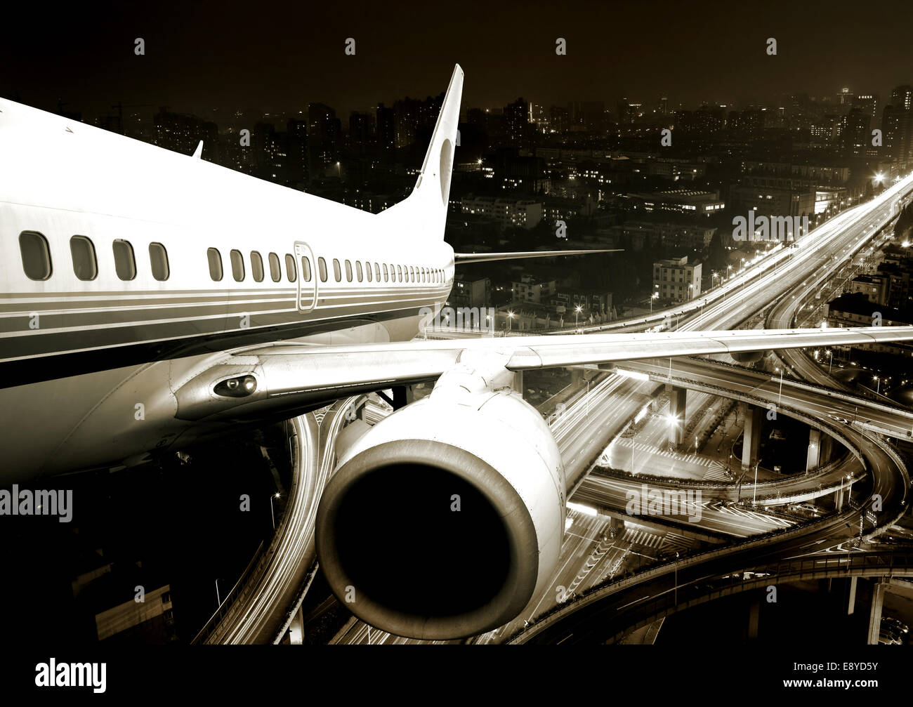 the airplane take off from the city night. Stock Photo