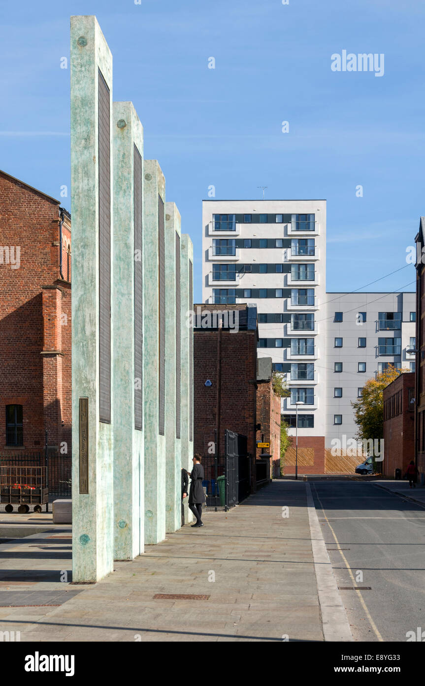 Artworks by Dan Dubowitz at Cutting Room Square, Ancoats, Manchester, England, UK. The white building is the NQ4 apartment block Stock Photo