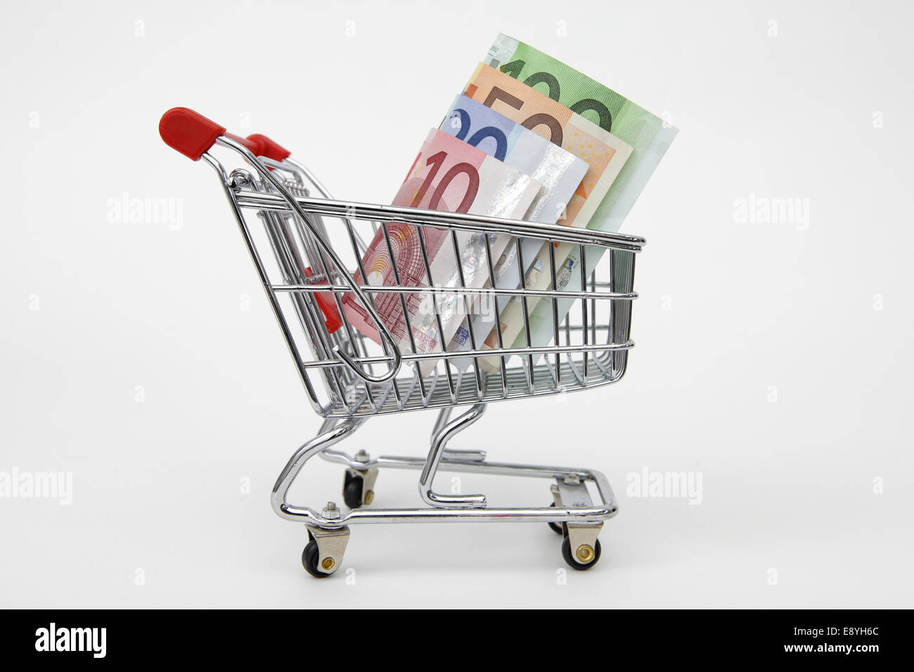 Shopping cart with money Stock Photo Alamy