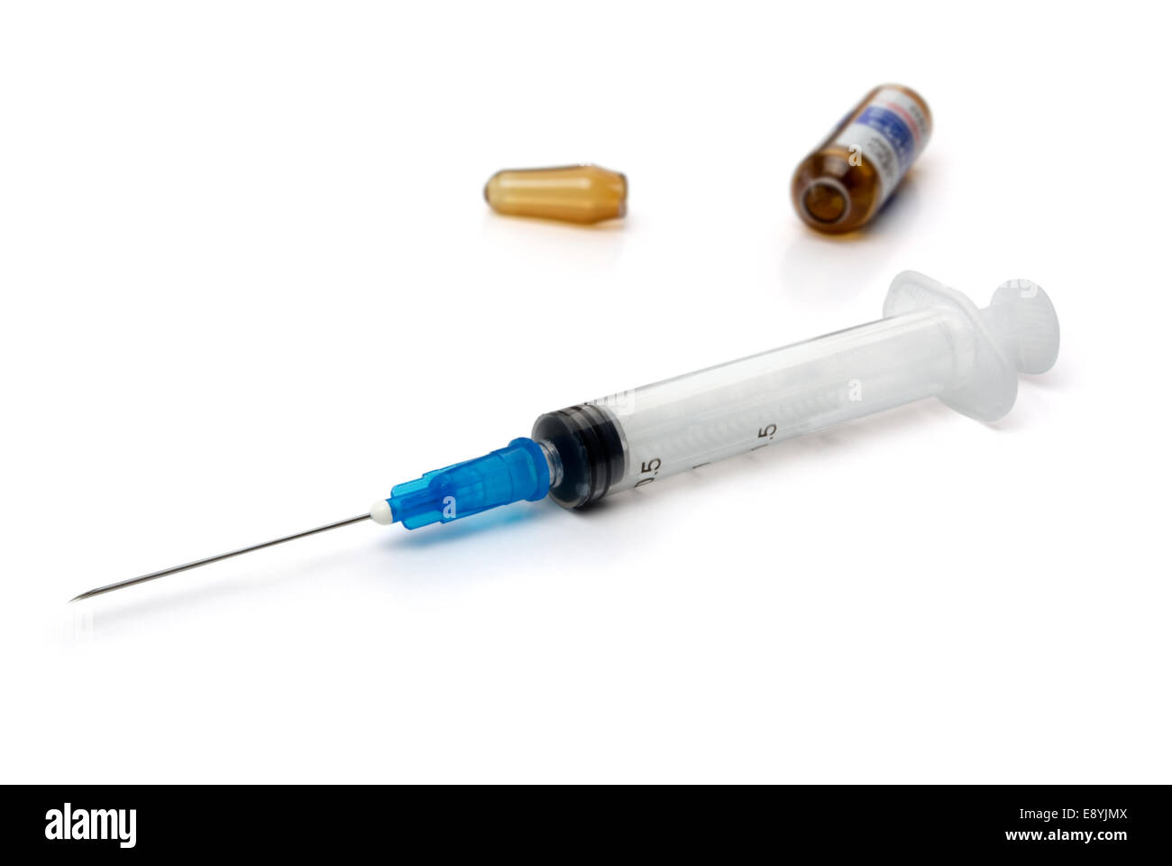 Syringe and  ampoule Stock Photo