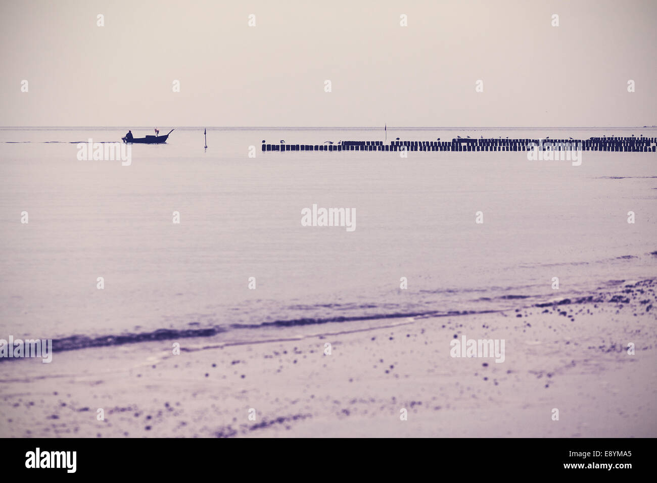 Nostalgic retro filtered sea landscape background. Stock Photo