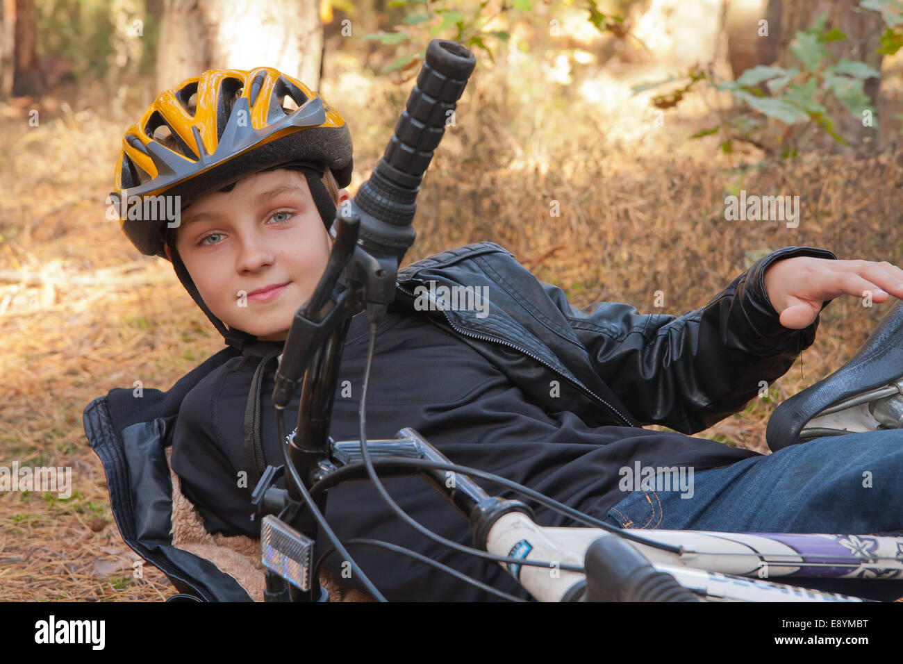 young boy in a bicycle helmet Stock Photo