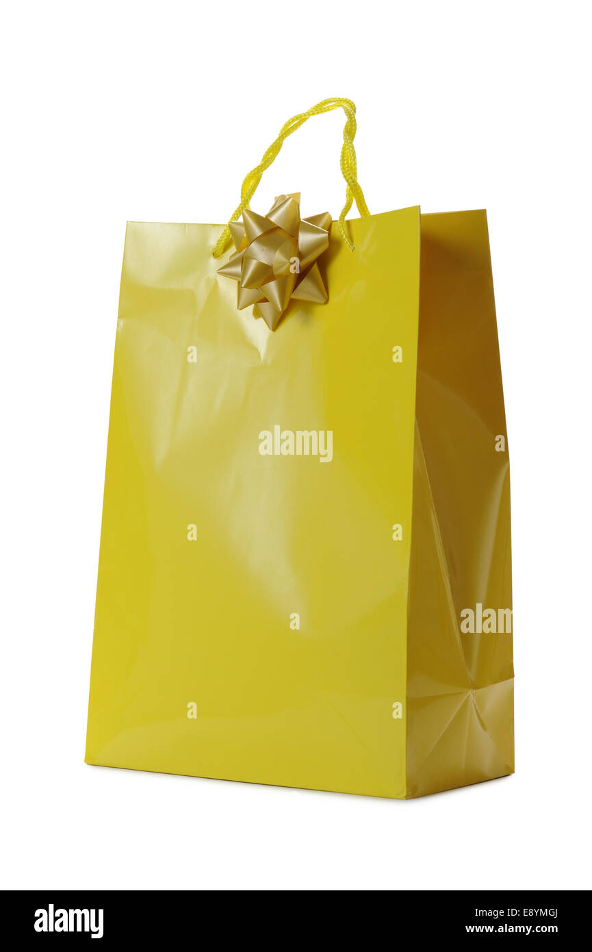 yellow shopping bag with bow on white background Stock Photo Alamy