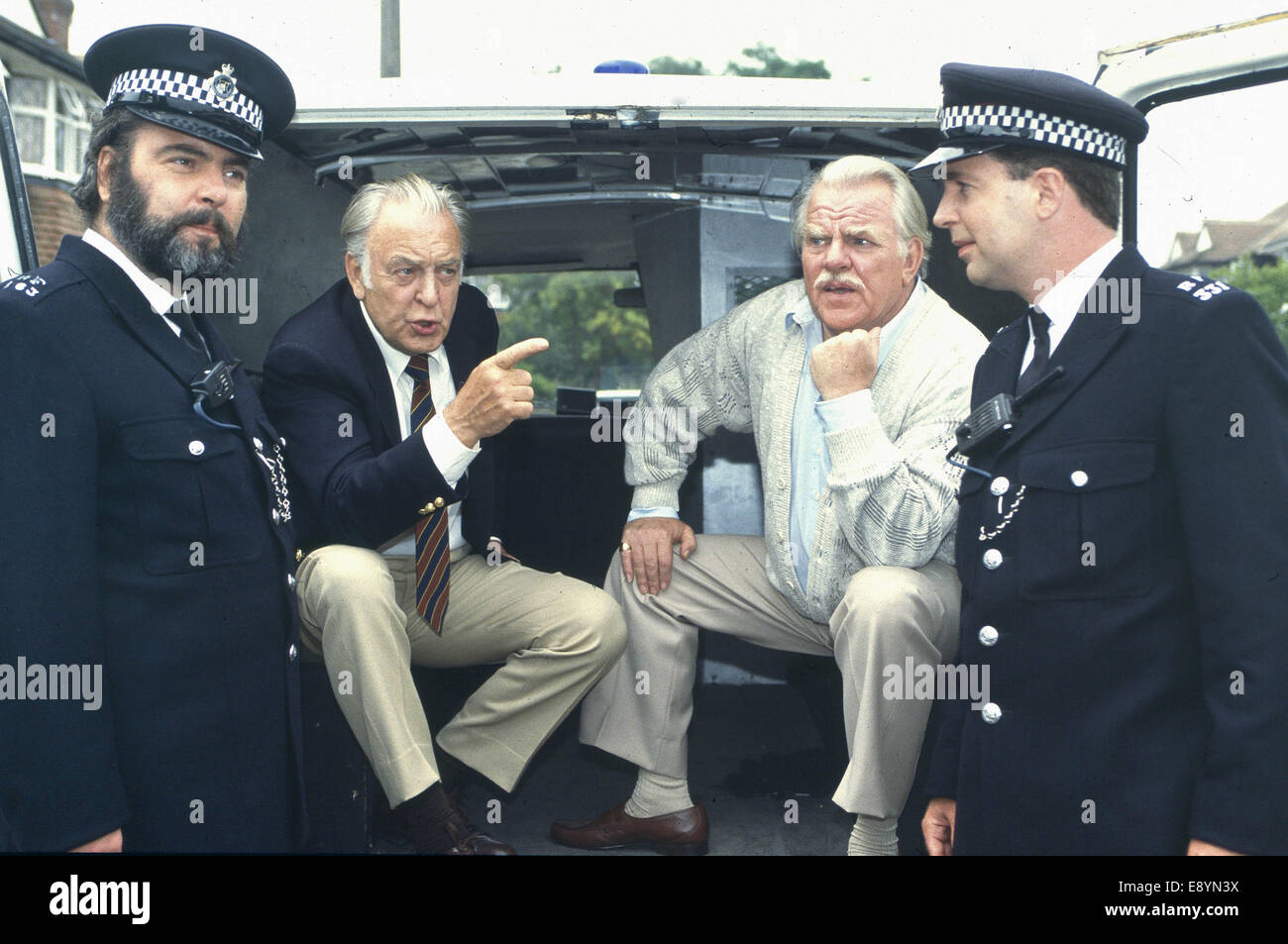 London. UK. LIBRARY: Sir Donald Sinden (C), Jeremy Sinden(L) and Marc ...