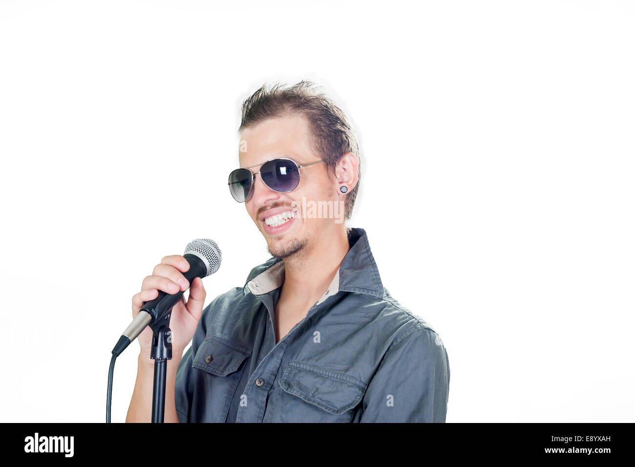 Handsome european singer on the white background Stock Photo