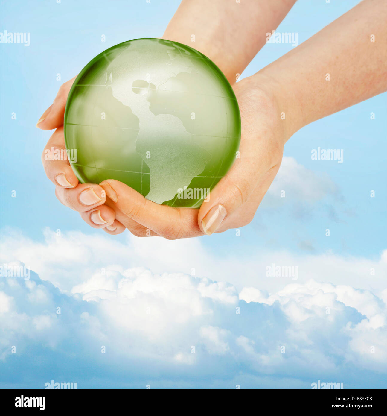 Hands holding globe hi-res stock photography and images - Alamy