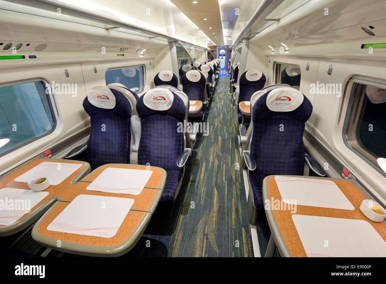 The inside of an empty First Class carriage of a Virgin Pendolino train (Editorial use only). Stock Photo