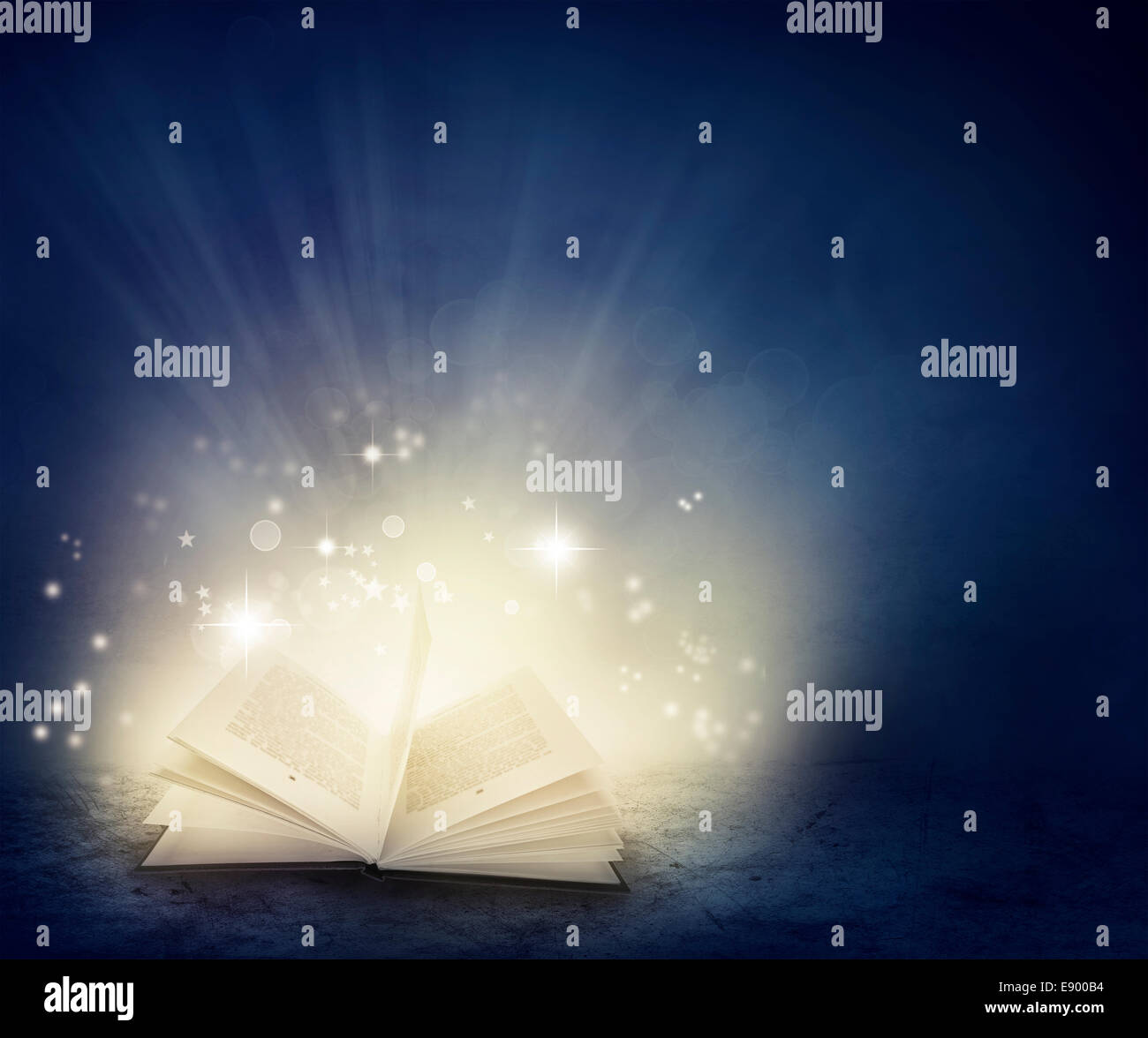 Open book and magical background Stock Photo