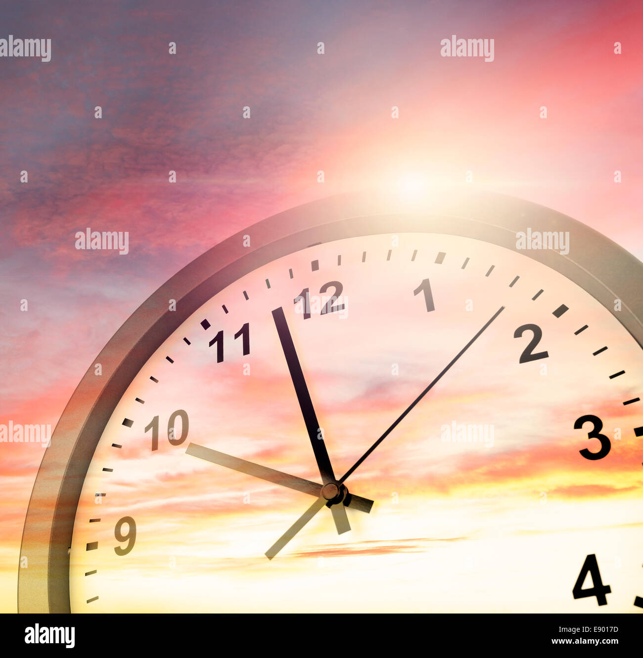 Clock face in bright sky Stock Photo Alamy