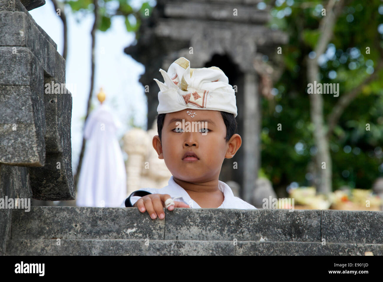 Portrait of a boy Pura Luhur Temple Ulu Watu Bali Indonesia Stock Photo