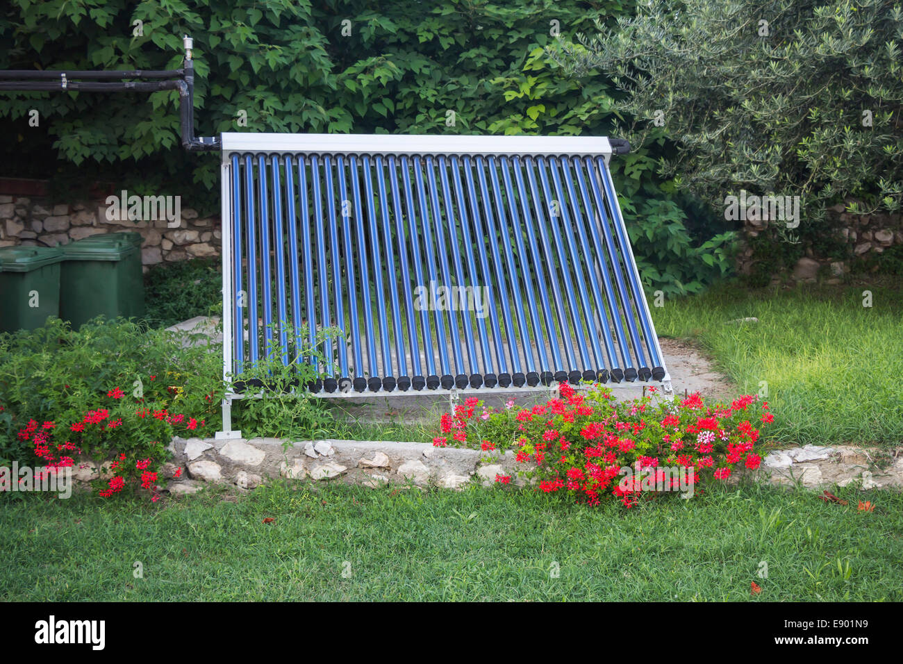 Vacuum solar water heating system in the yard house Stock Photo Alamy