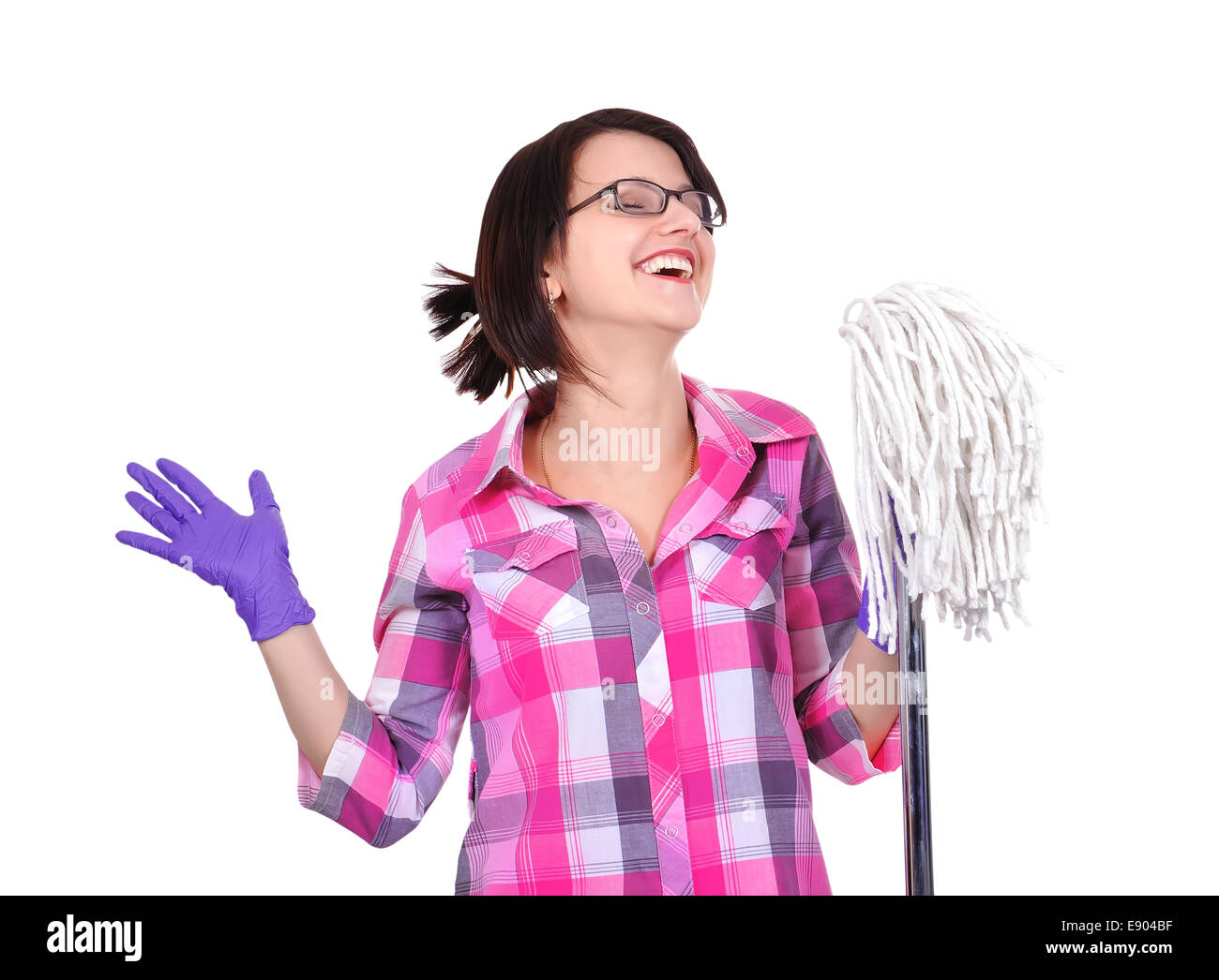 happiness cleaning woman singing with mop in hand Stock Photo