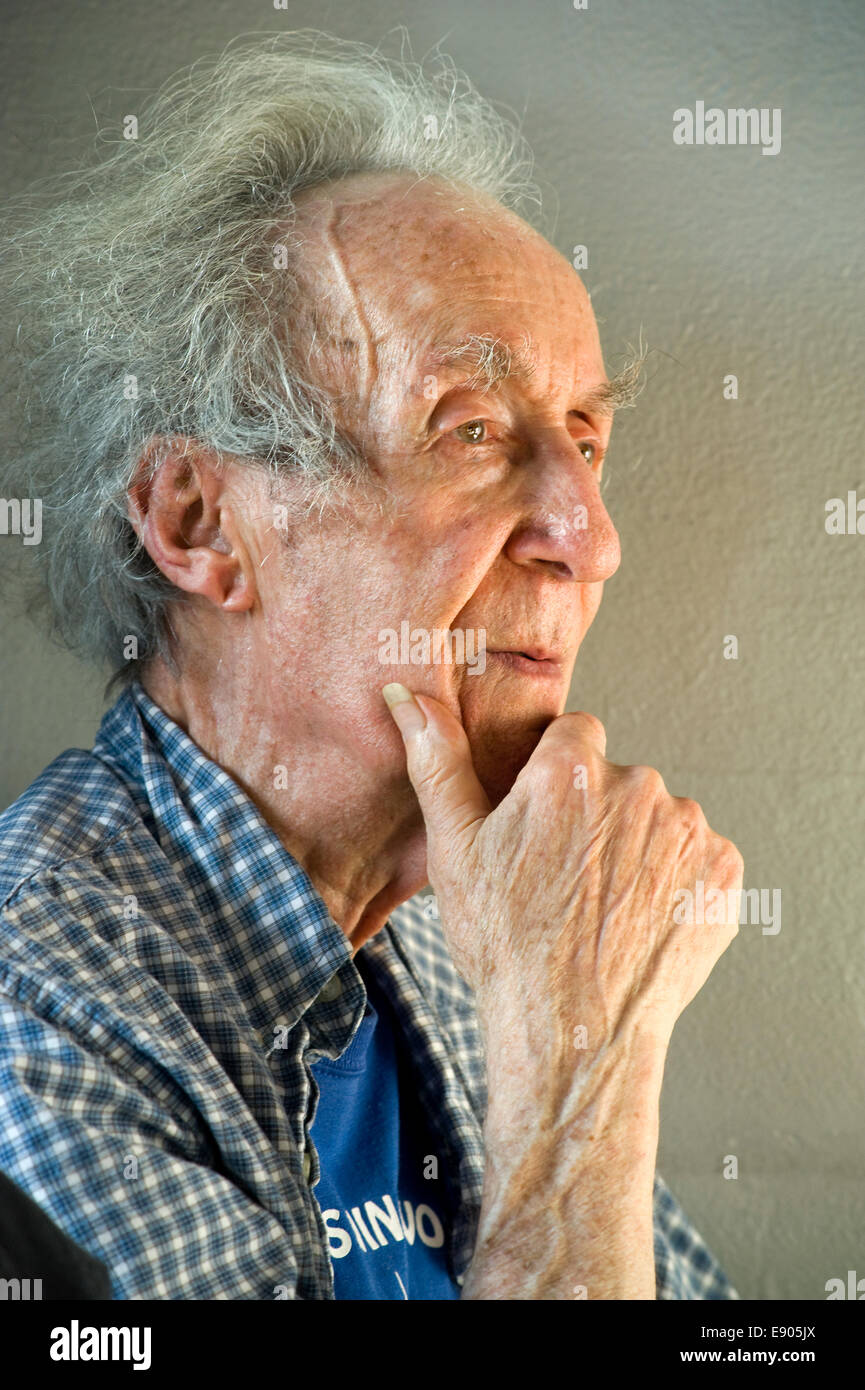 Portrait of an elderly man  listening to a music concert Stock Photo
