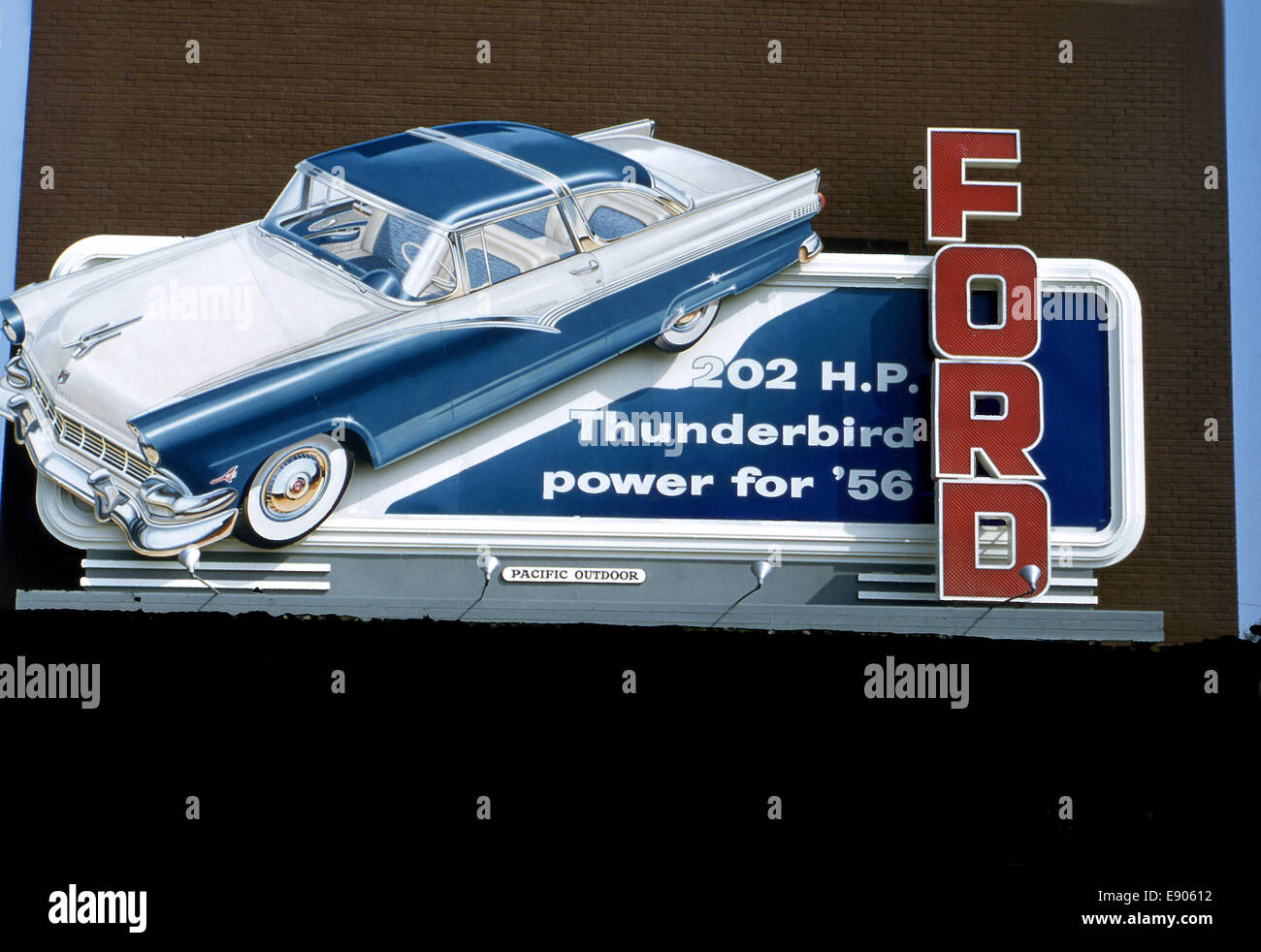 Billboard advertising Ford Thunderbird in 1956 Stock Photo