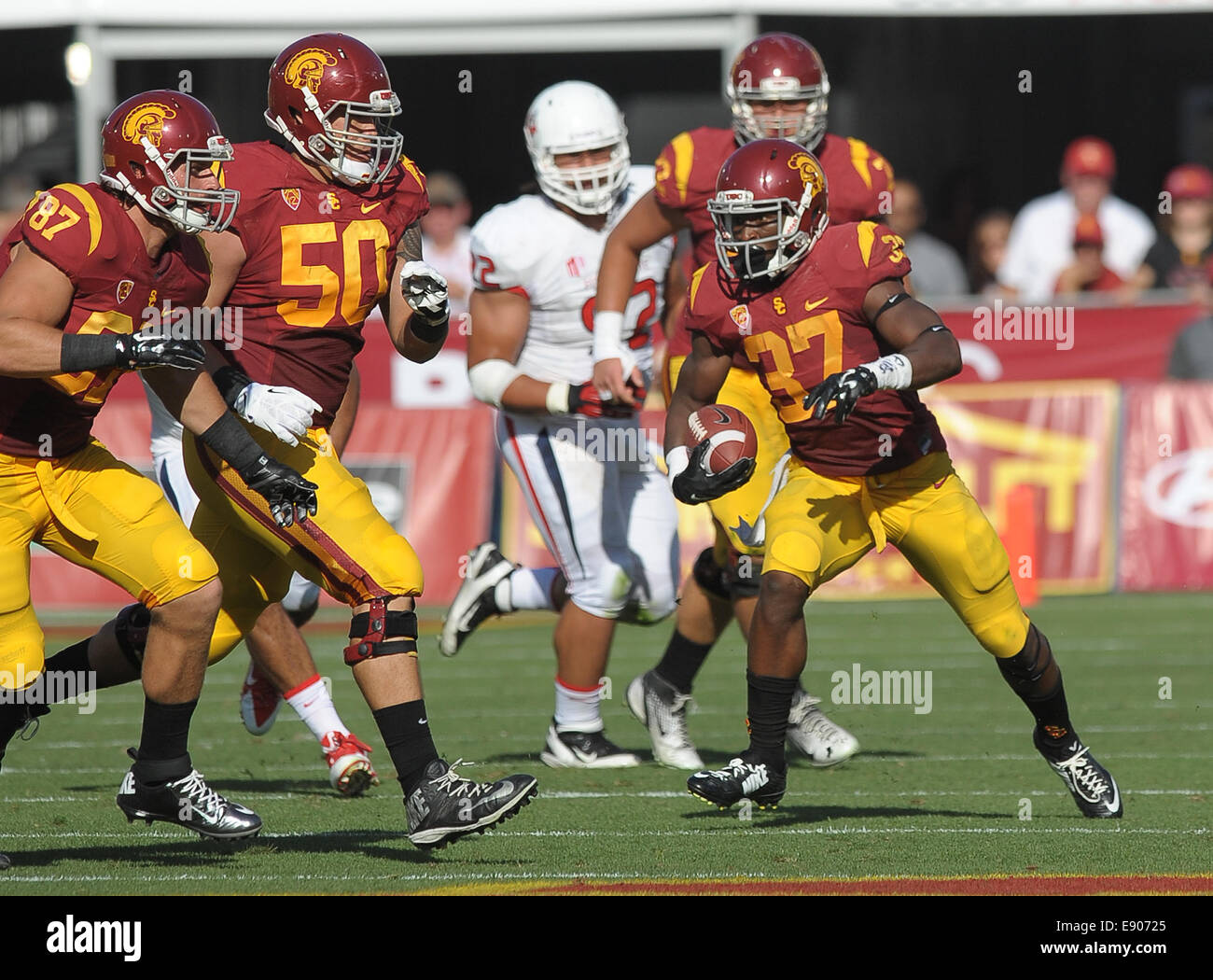 August 30, 2014, Los Angeles, CA...USC Trojans tailback (37) Javorius Allen, tightend (87) Chris Willson, offensive guard (50) Toa Lobendahn and offensive guard (72) Chad Wheeler in action beating the Fresno State bulldogs 52-13 on Saturday night. The Trojans ran a school- and Pac-12-record 105 plays while racking up 37 first downs and 701 yards of total offense to Fresno States 17 first downs and 317 yards, at the Los Angeles Memorial Coliseum, on August 30, 2014. (Mandatory Credit: Jose Marin / MarinMedia.org / Cal Sport Media) (ABSOLUTELY - ALL Complete photographer, and company credit(s) r Stock Photo