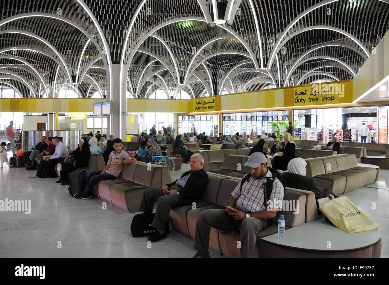 Baghdad. 16th Oct, 2014. Passengers are seen at Baghdad International