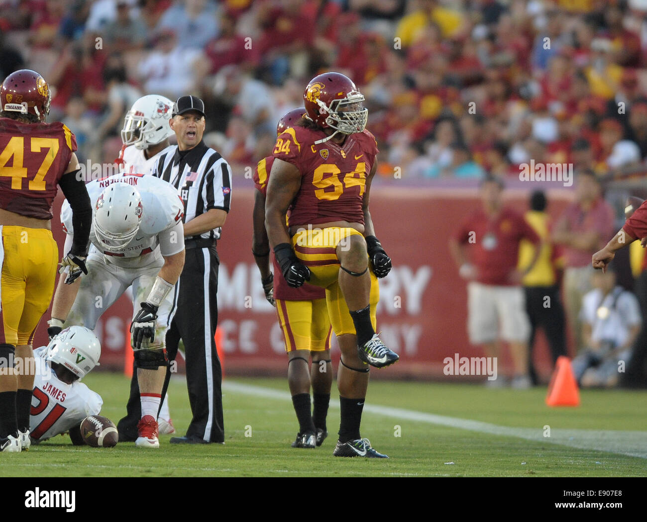 August 30, 2014, Los Angeles, CA... USC Trojans defensive end (94) Leonard Williams in action beating the Fresno State bulldogs 52-13 on Saturday night. The Trojans ran a school- and Pac-12-record 105 plays while racking up 37 first downs and 701 yards of total offense to Fresno States 17 first downs and 317 yards, at the Los Angeles Memorial Coliseum, on August 30, 2014. (Mandatory Credit: Jose Marin / MarinMedia.org / Cal Sport Media) (ABSOLUTELY - ALL Complete photographer, and company credit(s) required) Stock Photo