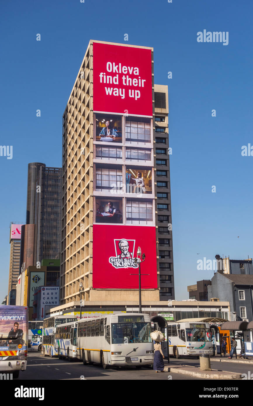 JOHANNESBURG, SOUTH AFRICA People and buses and buildings in Gandhi