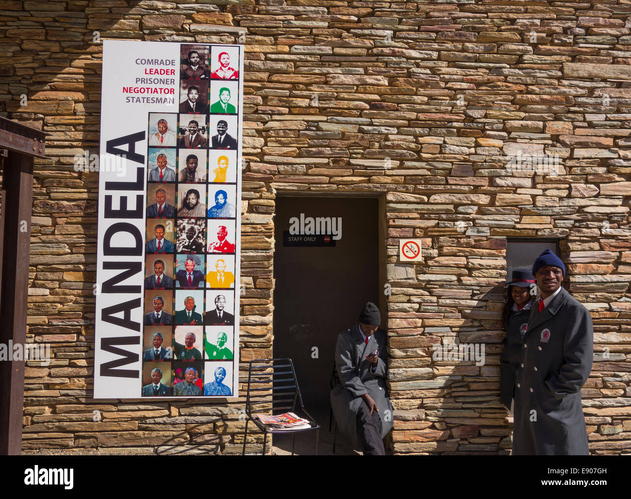 JOHANNESBURG, SOUTH AFRICA - Nelson Mandela exhibit poster at the Apartheid Museum and staff. Stock Photo