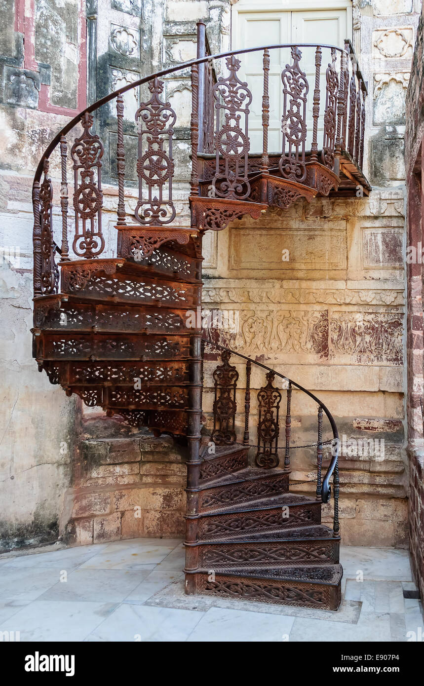 Old wrought iron spiral staircase of Mehrangarh Fort, Rajasthan, Jodhpur, India Stock Photo