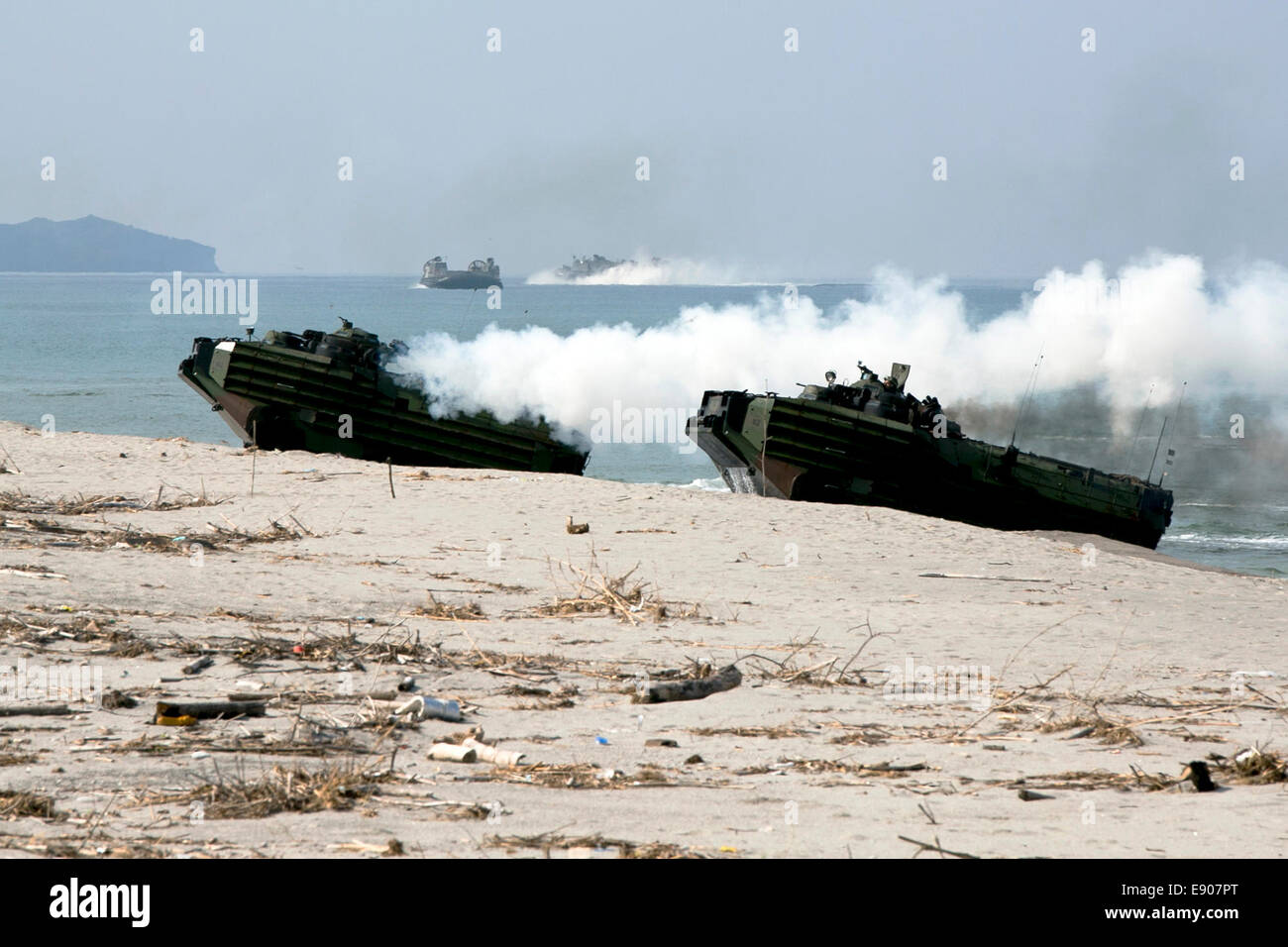 U.S. Marines with India Company, 3rd Battalion, 5th Marine Regiment, 31st Marine Expeditionary Unit and Philippine marines arrive at a beach during a mechanized assault as part of Amphibious Landing Exercise (PHIBLEX) 15 in Zambales, Luzon, Philippines, O Stock Photo