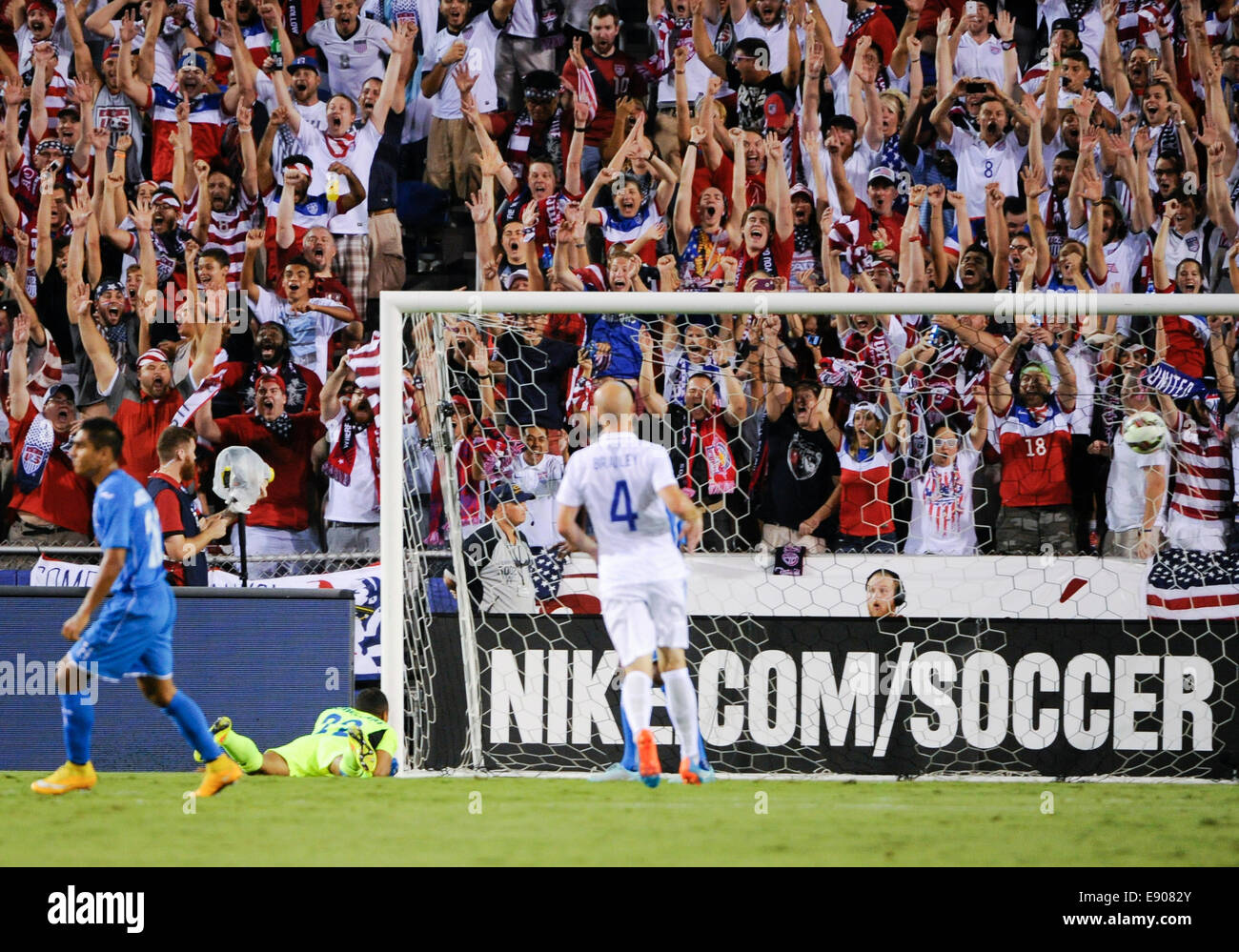 Florida, USA. 14th Oct, 2014. US fans cheer in the stands after United States Forward Jozy Altidore (not shown) scores past Honduras Goalkeeper Donis Escober (22) during an international friendly between the US Men's National Team and Honduras at FAU Stadium in Boca Raton, Florida © Action Plus Sports/Alamy Live News Stock Photo