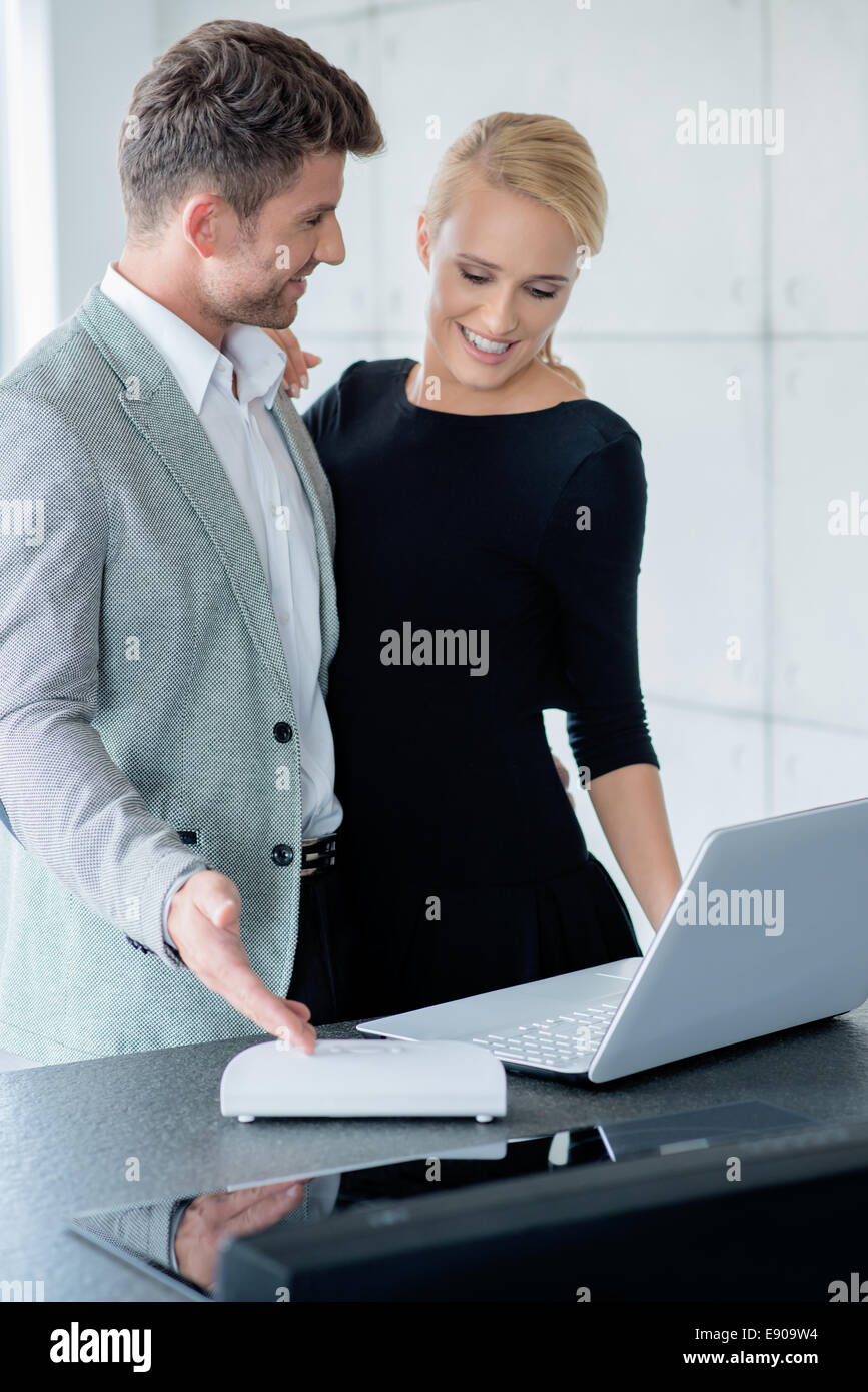 Young Caucasian Couple Looking Displayed Laptop Stock Photo - Alamy