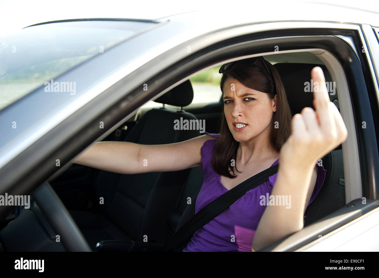 Car driver gives the finger Stock Photo