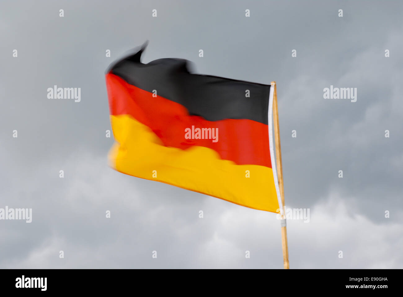 Germany flag with storm clouds Stock Photo