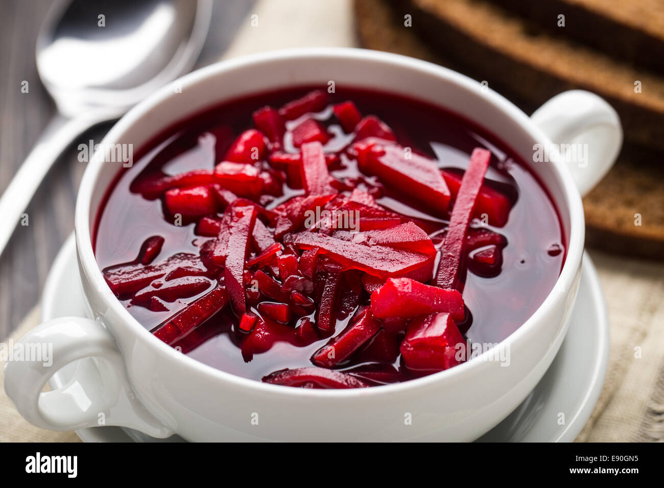 Bowl of red beetroot soup stock photo alamy