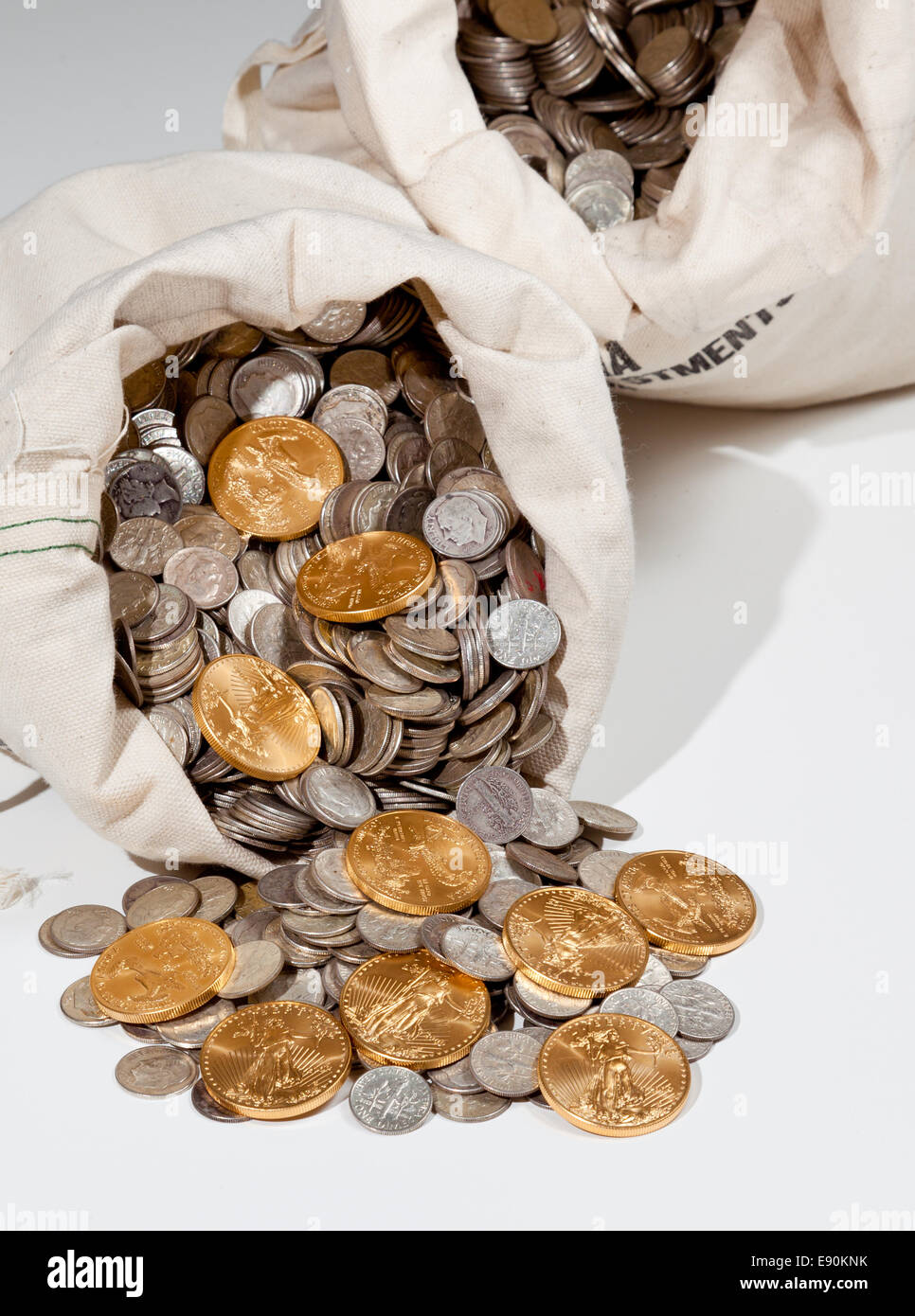 Bag of silver and gold coins Stock Photo