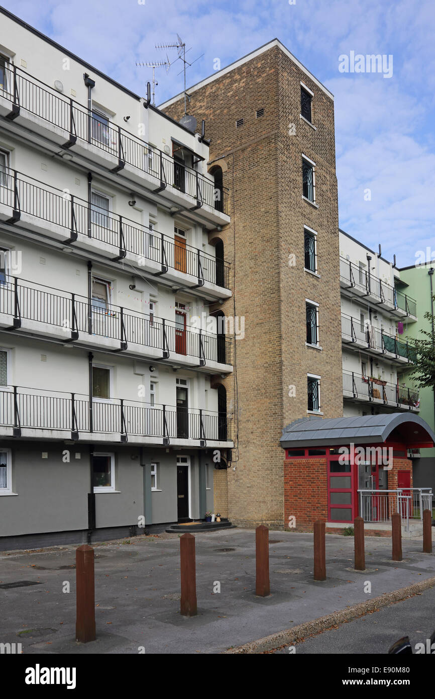 A newly refurbished block on a south London council estate showing secure entrance, stair tower and access balconies Stock Photo