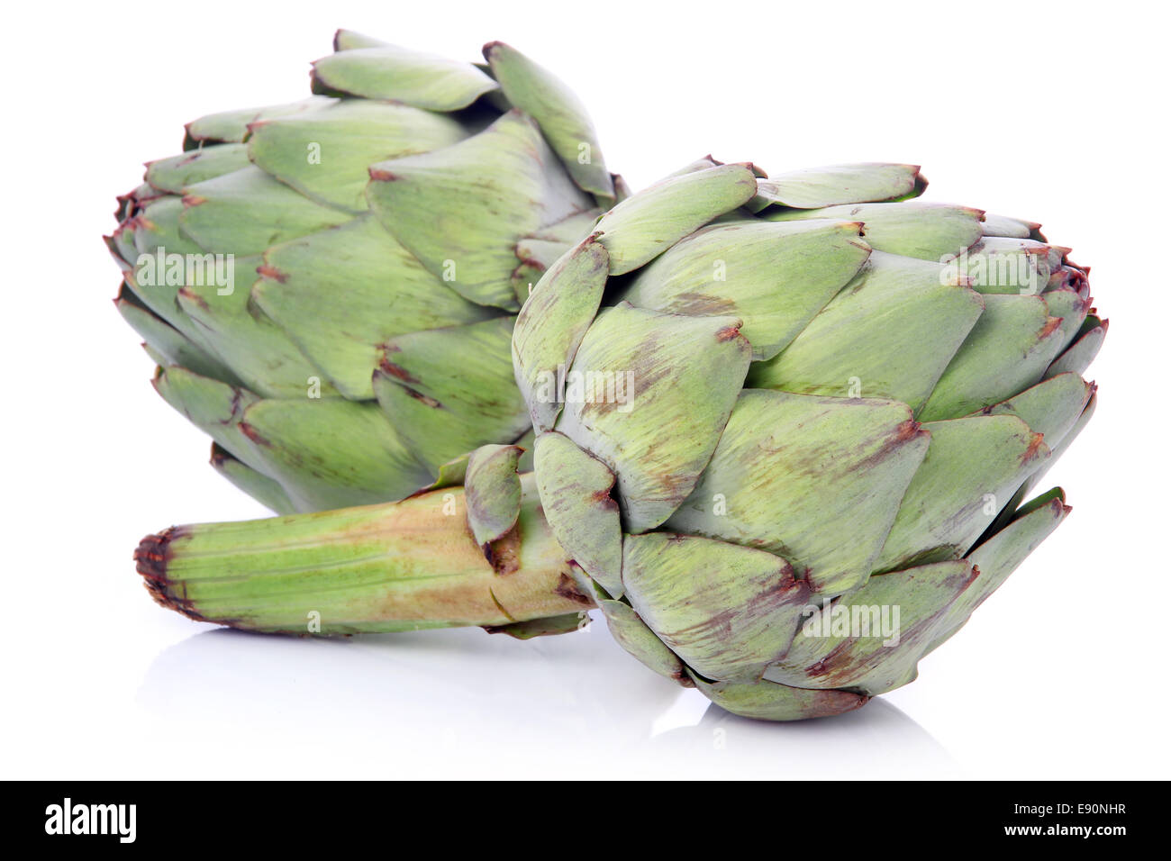 Ripe green artichoke vegetables isolated Stock Photo