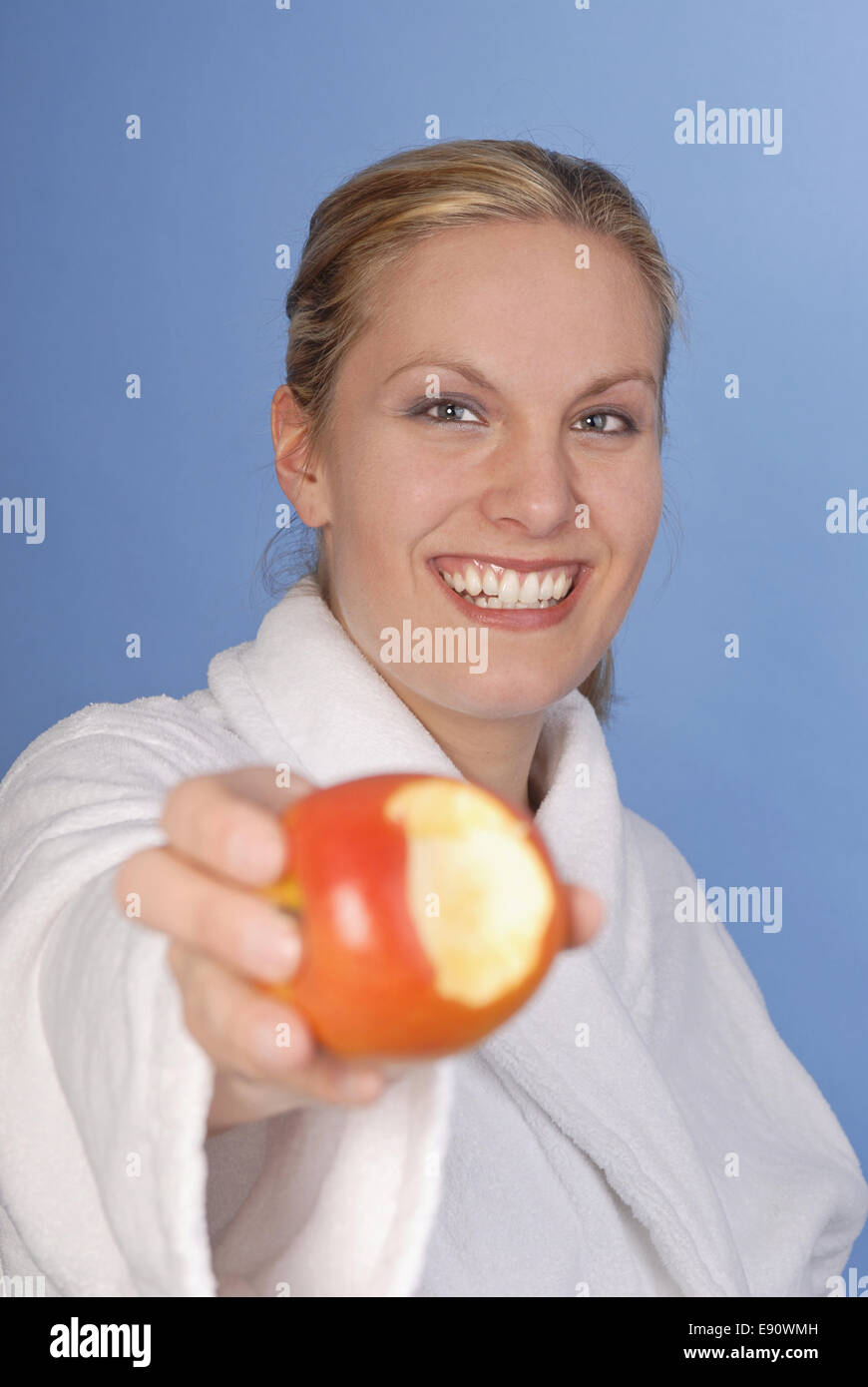 Woman with apple Stock Photo