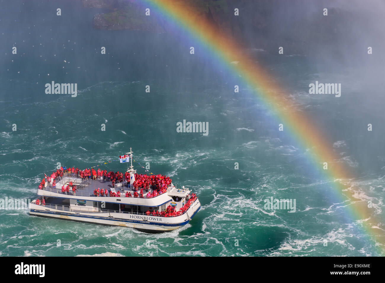 The Hornblower loaded with tourists entering the Horseshoe Falls, part of the Niagara Falls, Ontario, Canada. Stock Photo