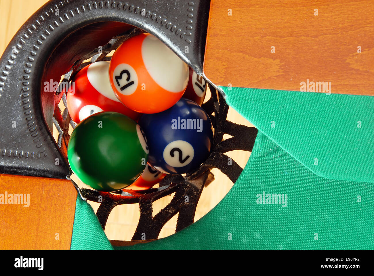 Balls in Billiards table pocket Stock Photo Alamy