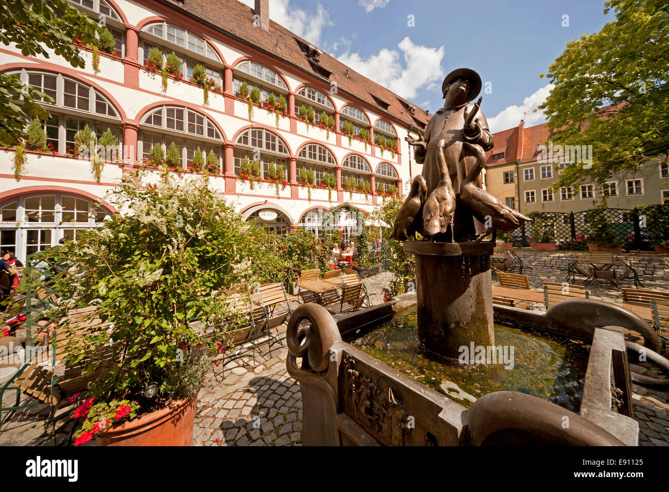 fountain and hotel of the Bischofshof courtyard in Regensburg, Bavaria, Germany, Europe Stock Photo