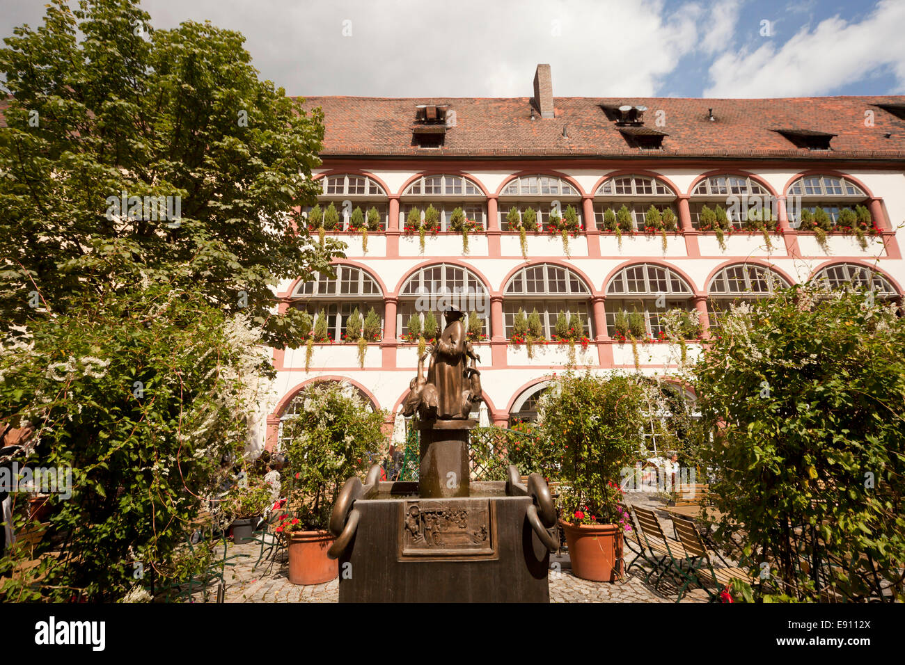 fountain and hotel of the Bischofshof courtyard in Regensburg, Bavaria, Germany, Europe Stock Photo