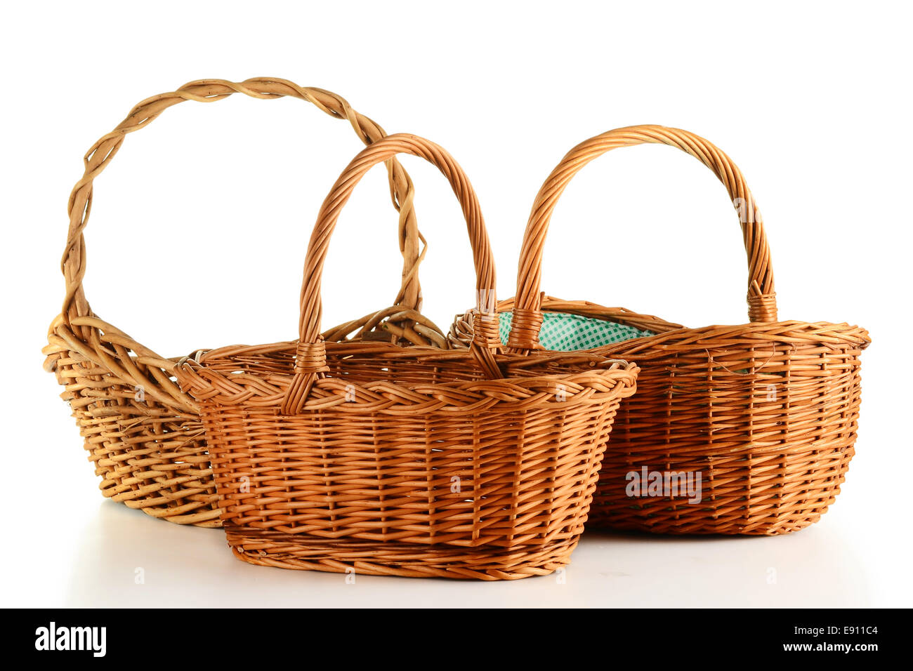 Empty wicker baskets isolated on white Stock Photo Alamy
