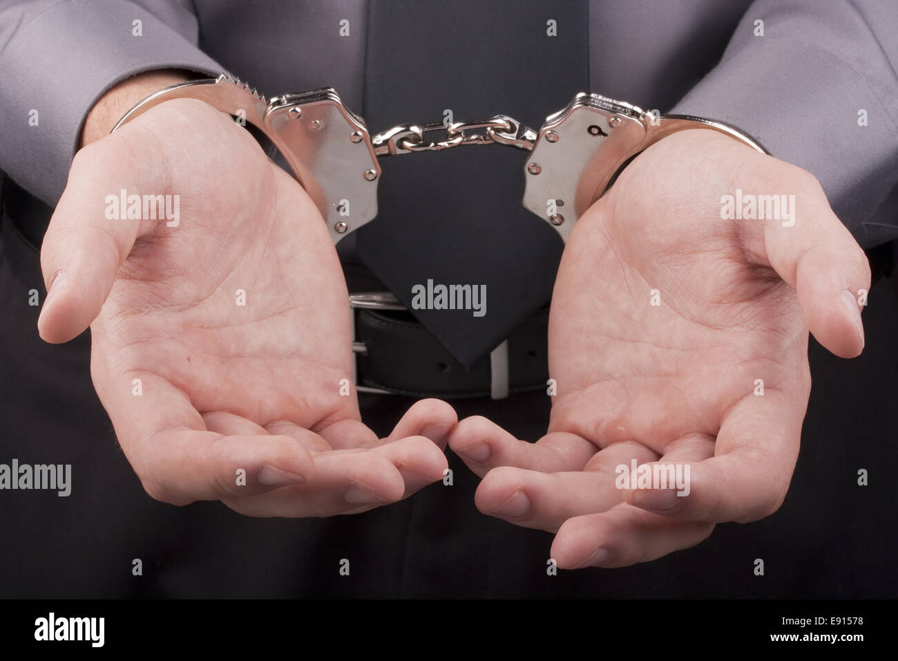Arrest handcuffs Stock Photo Alamy