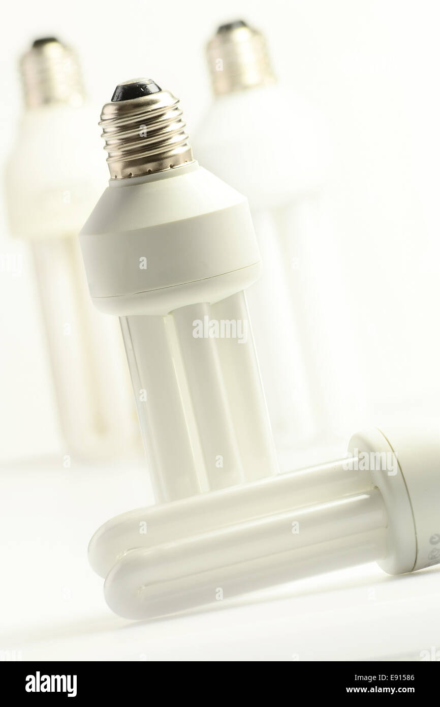 Composition with compact fluorescent lamp Stock Photo