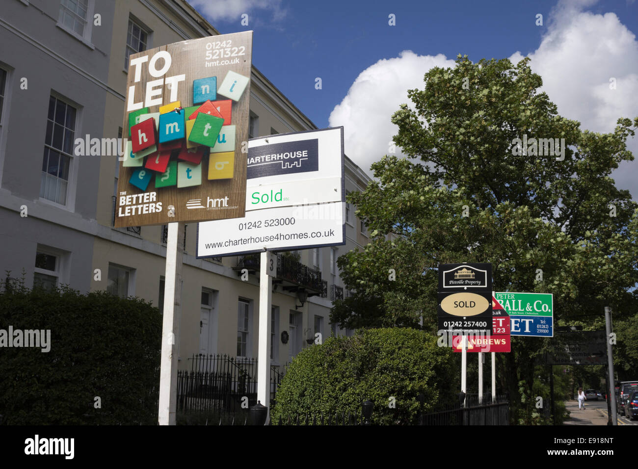 Estate Agent boards in Pittville area, Cheltenham, Gloucestershire, England, United Kingdom, Europe Stock Photo