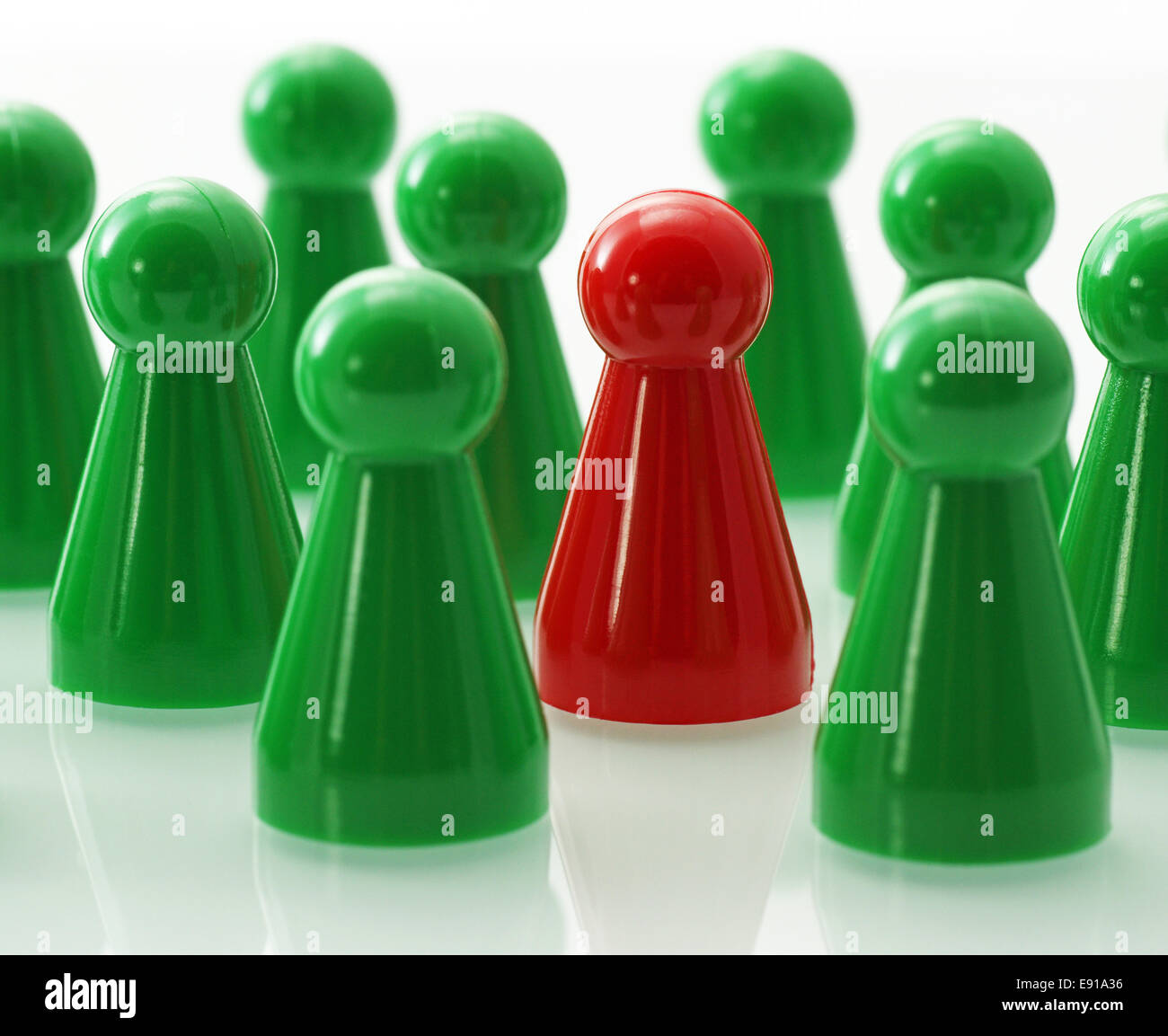 Green Team with red Leader Stock Photo - Alamy