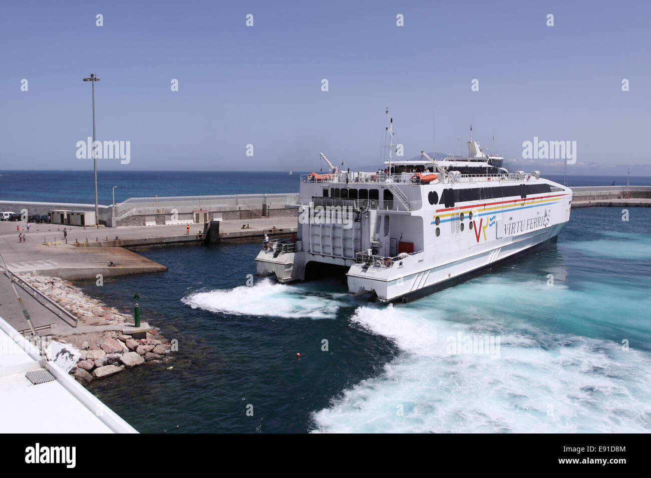 Tarifa Spain a Virtu Ferries ferry boat arrives in Tarifa port on a service from Tangier Morocco Stock Photo