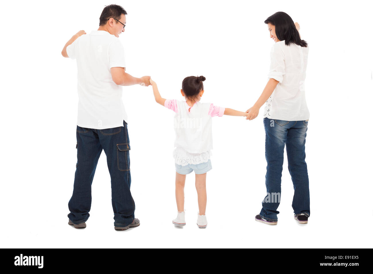 happy little girl hold parents hands. isolated on white background Stock Photo
