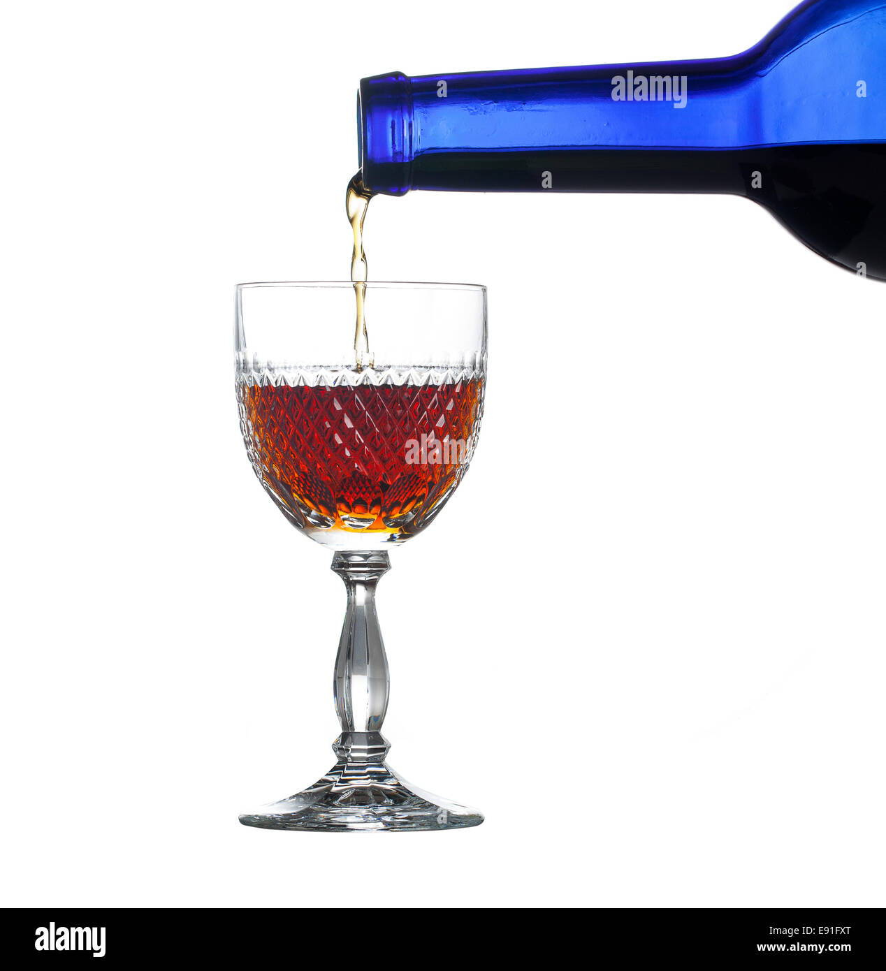 Sherry or port being poured into glass Stock Photo Alamy