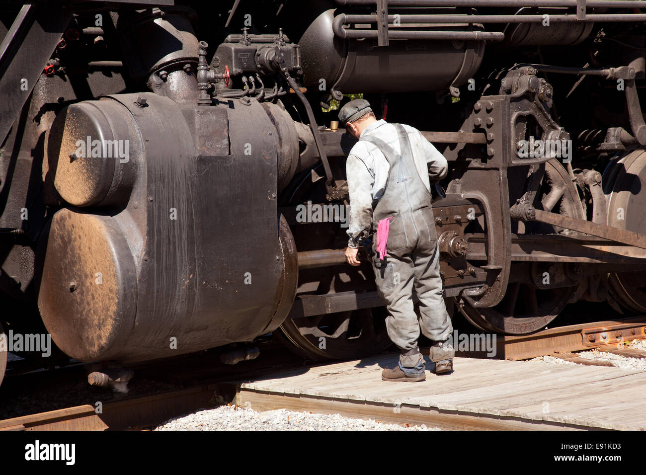 Mechanic checks locomotive Stock Photo