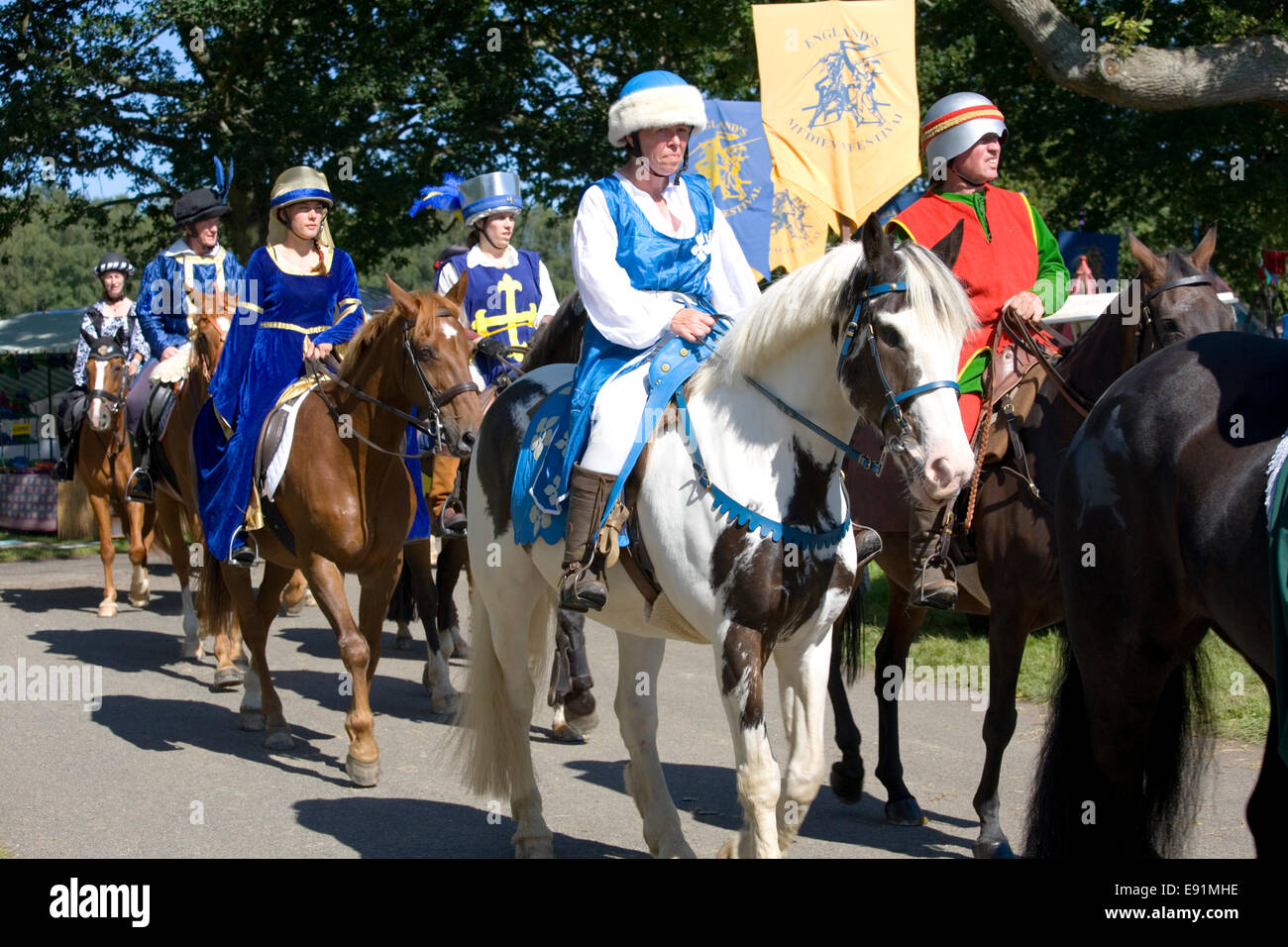 Herstmonceux, East Sussex, England. Mounted parade at medieval festival in the grounds of Herstmonceux Castle. Stock Photo